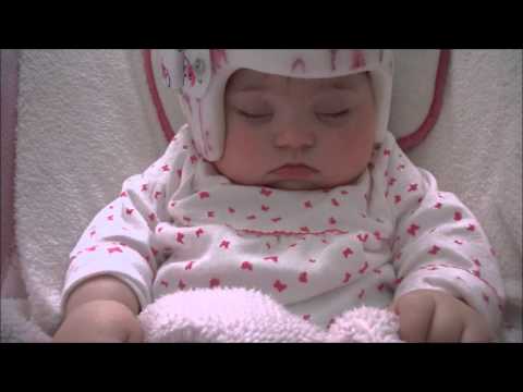 Sleeping Baby with a Helmet / მძინარე მარიამი